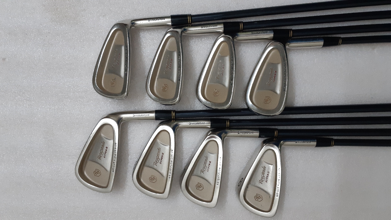 full set of golf clubs in bag